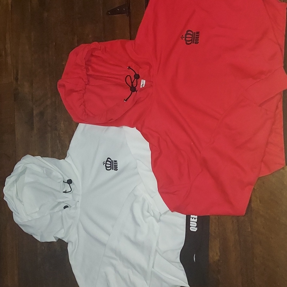 Two cropped long sleeve hoodies